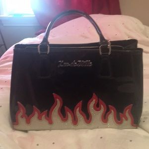 Used vinyl black red&silver flame Lux De Ville bag